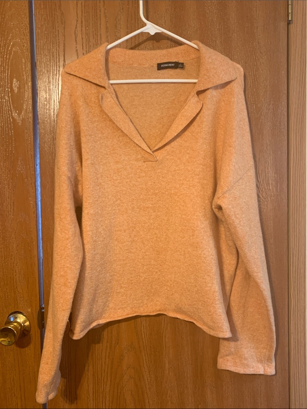 Feminine Open-Collar Peach V-Neck Sweater